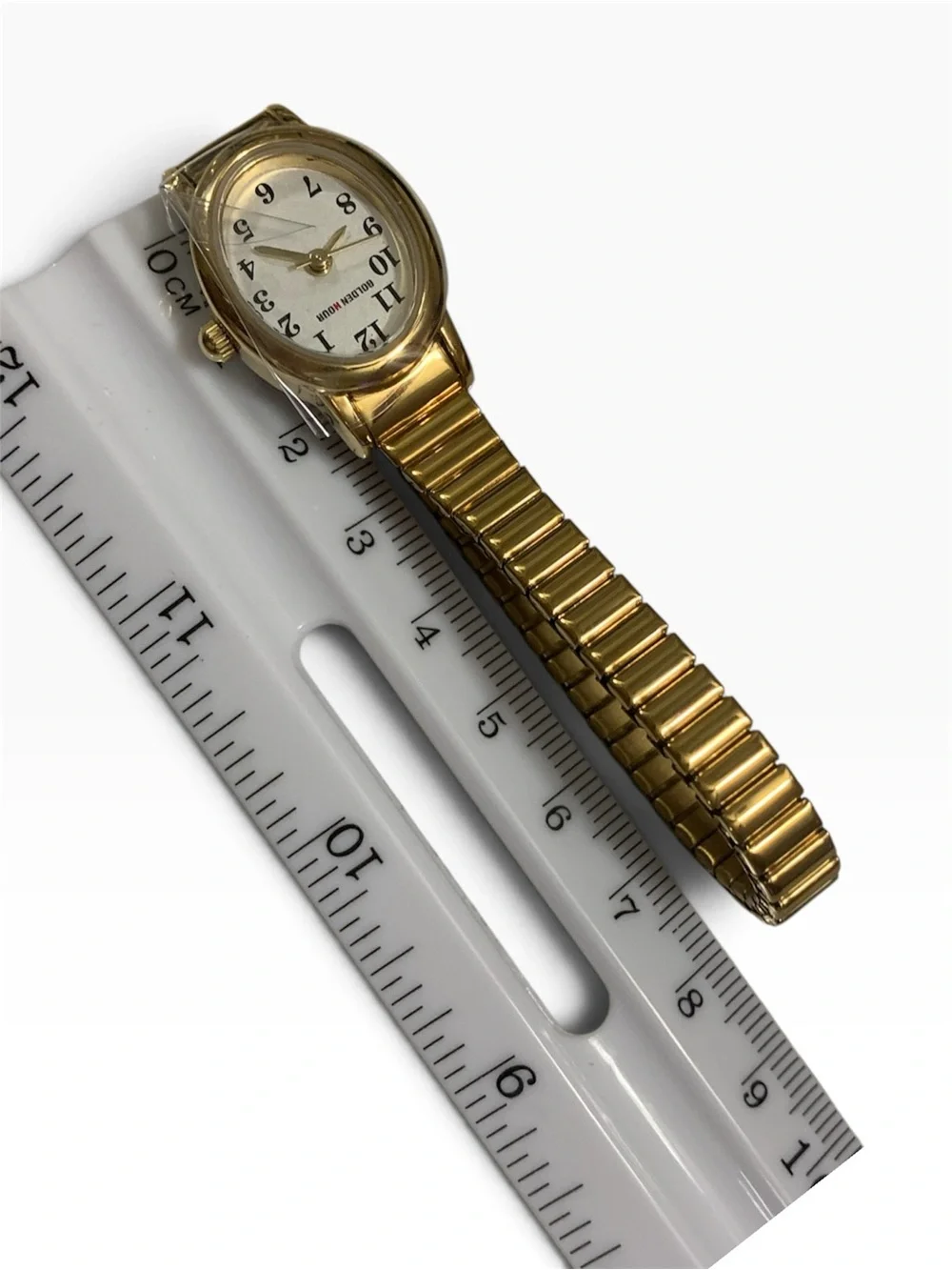 GOLDEN HOUR Women’s Gold-Tone Oval Analog Quartz Watch White Dial Arabic